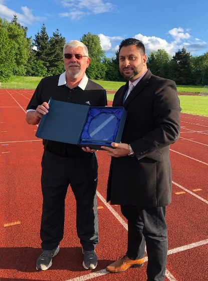 Image of Steve Oldham receiving his award from Dudley Council